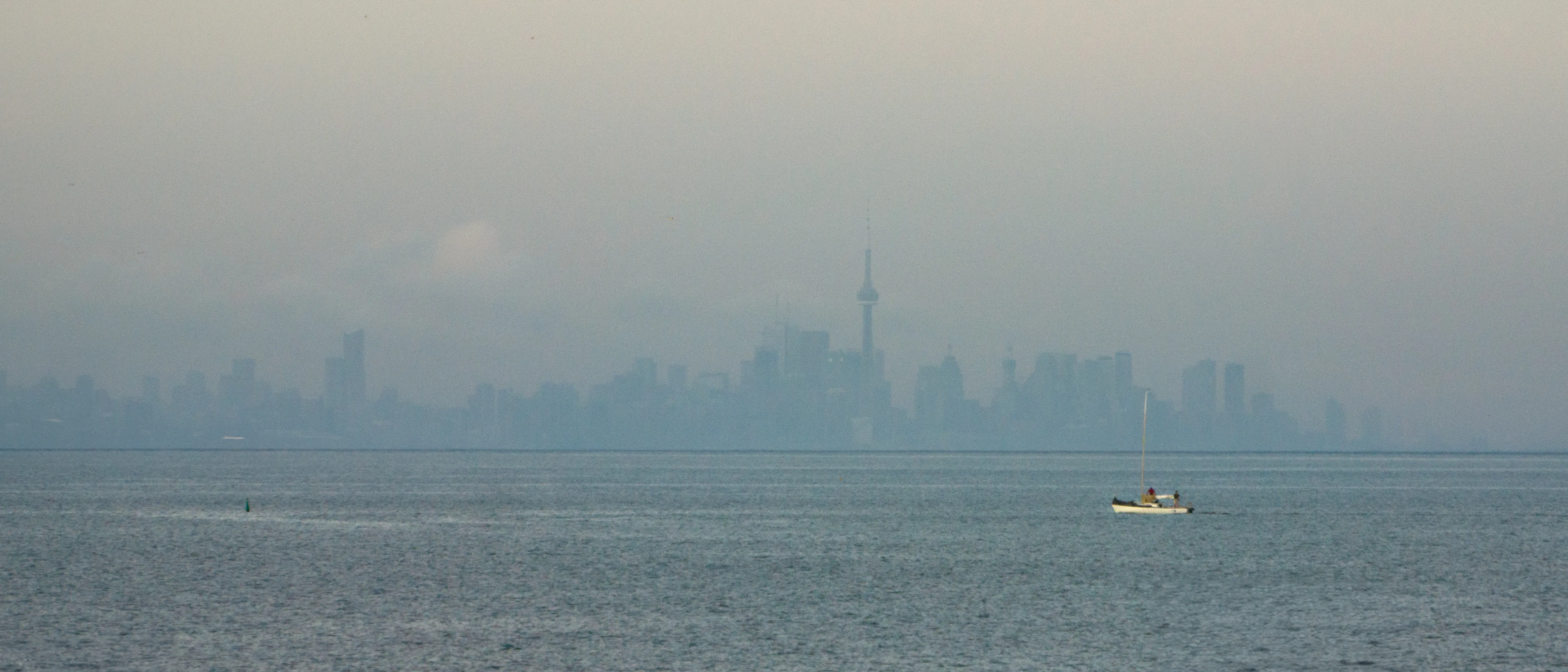 Boat in front of Toronto's skyline