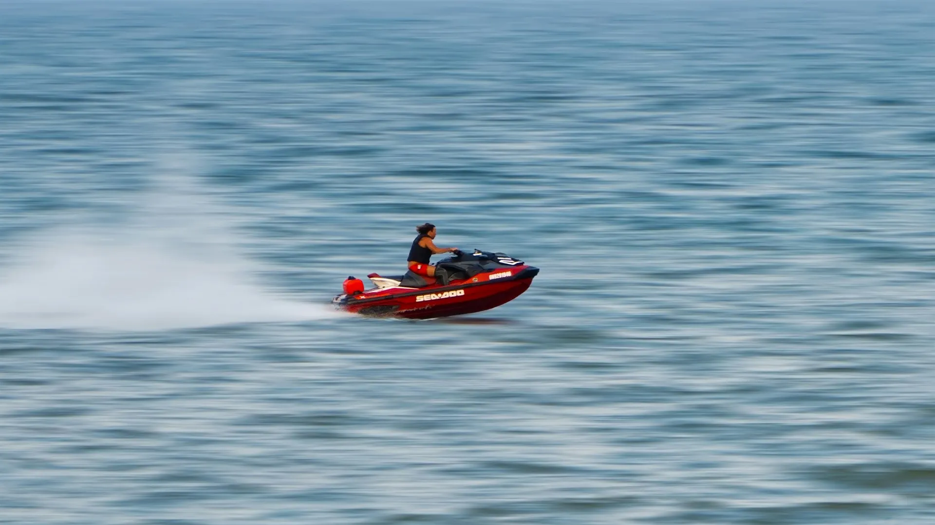 Man riding jet ski on the lake.