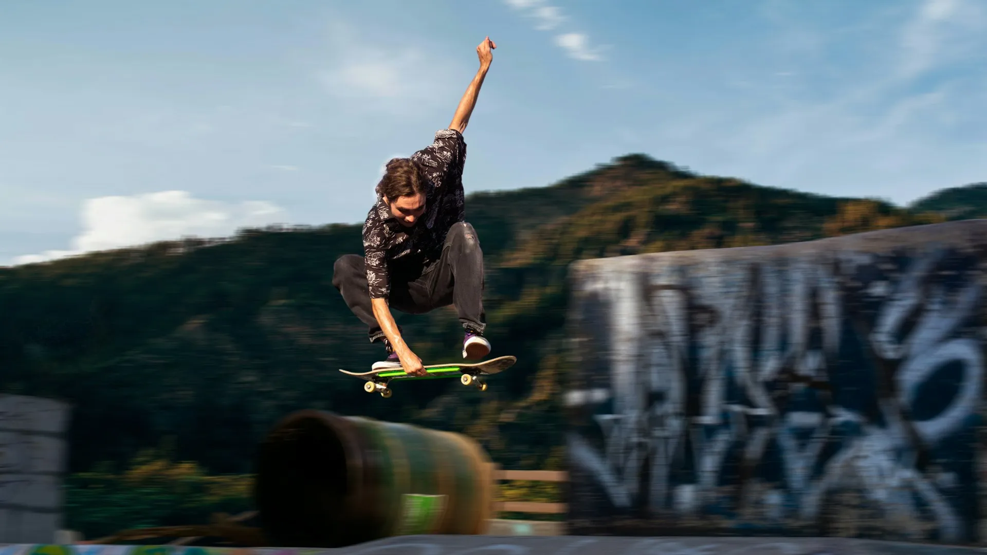 Another kicklfip in skatepark.